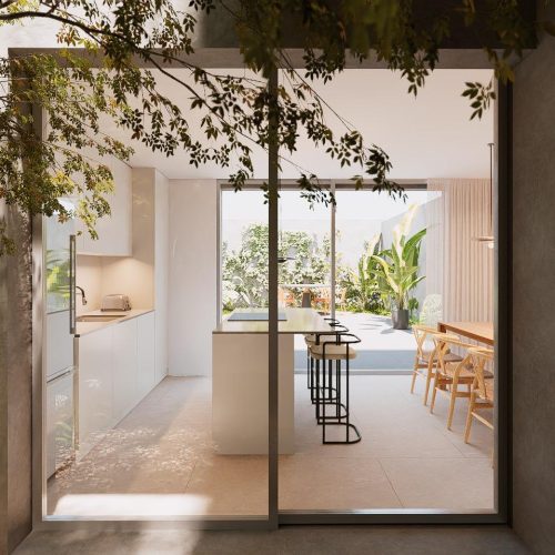 Cocina abierta en vivienda unifamiliar moderna con grandes ventanales y acceso al jardín en Valencia